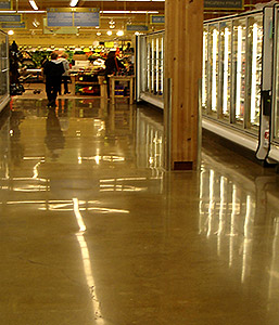 On this project by Seattle-based company Concrete Restoration, the end user desired a cream finish. In order to keep the cream, the floor was finished to to a low flatness level (F(f)), leaving behind a wavy pattern in the existing floor.