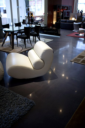 High-end furniture pops on this polished concrete floor.
