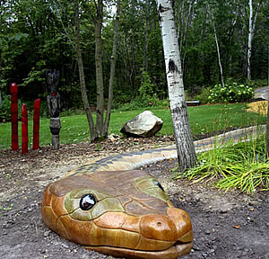 concrete garden path in the shape of a snake spans for 150 feet.