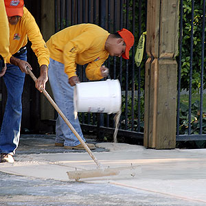 The polymer-modified cementitious overlay installs and dries quickly, so residents were able to continue using the pool each afternoon and evening.