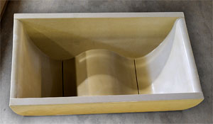 This contoured WaveTub by Sonoma Cast Stone is roomy enough to seat two. The tub comes with an optional heating feature to keep the water temperature constant.