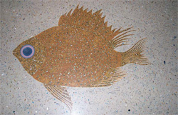 Gold fish in terrazzo in Emeril's restaurant.