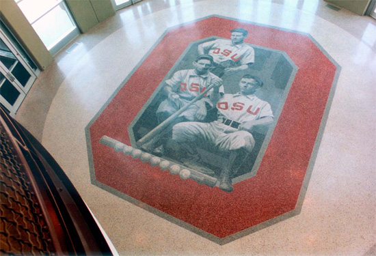 The Jerome Schottenstein Center is home to the Ohio State Buckeyes hockey and basketball teams as well as this 71,000- square-foot terrazzo floor, which won 1998 Job of the Year and Job of the Century from the National Terrazzo and Mosaic Association. The floor features mural portraits of former student athletes and was created using six different shades of gray.