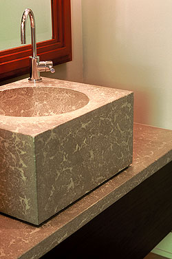 This cube sink and vanity, fabricated by Concrete Concepts and Design, is made from Buddy Rhodes Bone White Concrete Counter Mix, which is specially formulated for making countertops, fireplace surrounds, bathroom vanities, sinks, concrete furniture and other architectural elements.