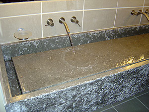Concrete sink with an invisible drain.