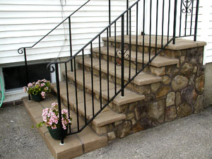 The concrete steps have been restored and look much more clean and safe with this upgrade.