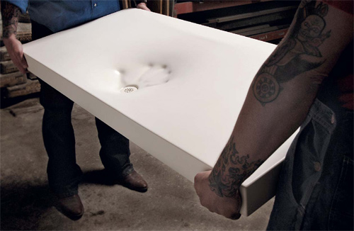 Brandon Gore of Gore Design Co. in Tempe, Ariz., says he's been successfully producing GFRC sinks for the past five years. Seen here is a white GFRC sink he created using a fabric form, which, subsequently, Gore Design started to produce. The company also sells a video showing the process.