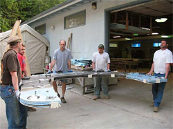 Five men show how lightweight concrete countertops can be when reinforced with GFRC.